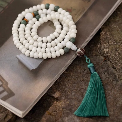 A long white jade Bodhi bead bracelet with 6x8mm beads, shown in various style options including cloisonne and lotus designs.