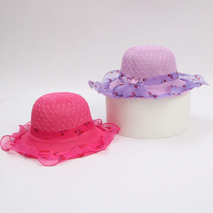 Children's princess straw hat with floral accents and wide brim for sun protection
