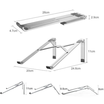 Black and silver aluminum laptop stand measuring 26cm wide on a wooden desk.