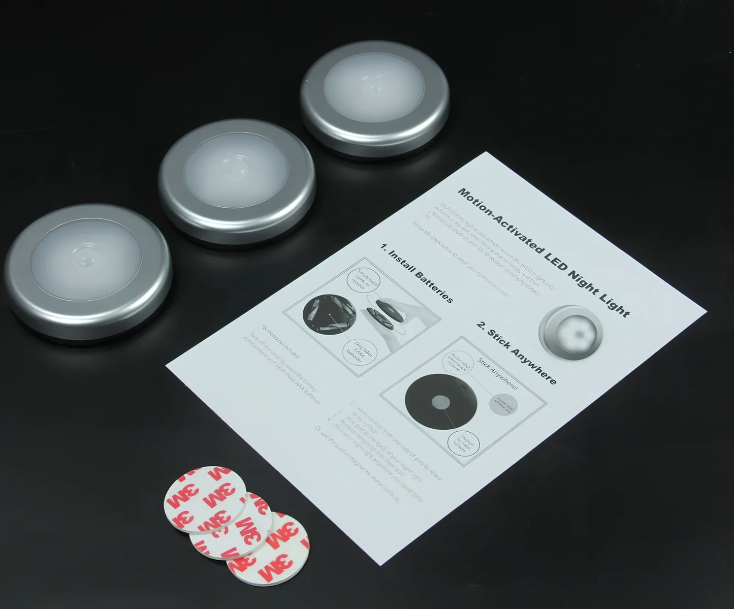 White motion-sensing LED cabinet lamp with magnetic back for wireless installation