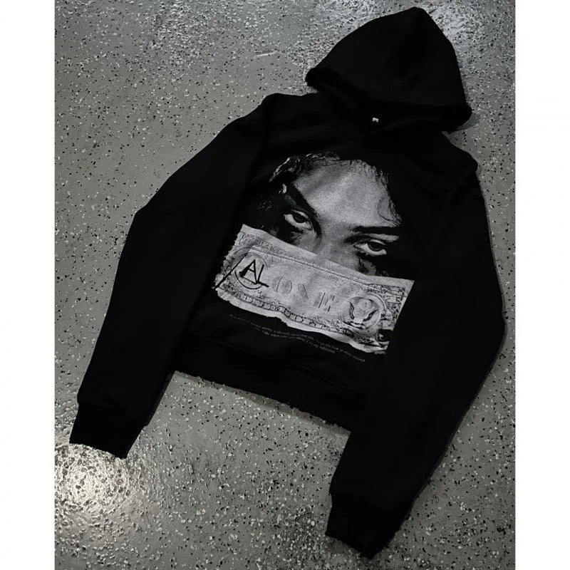 Black women's hoodie with cartoon print design in loose fit polyester construction
