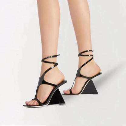 Women's black high heel sandals with a square toe and ankle buckle on a 9.5cm heel.