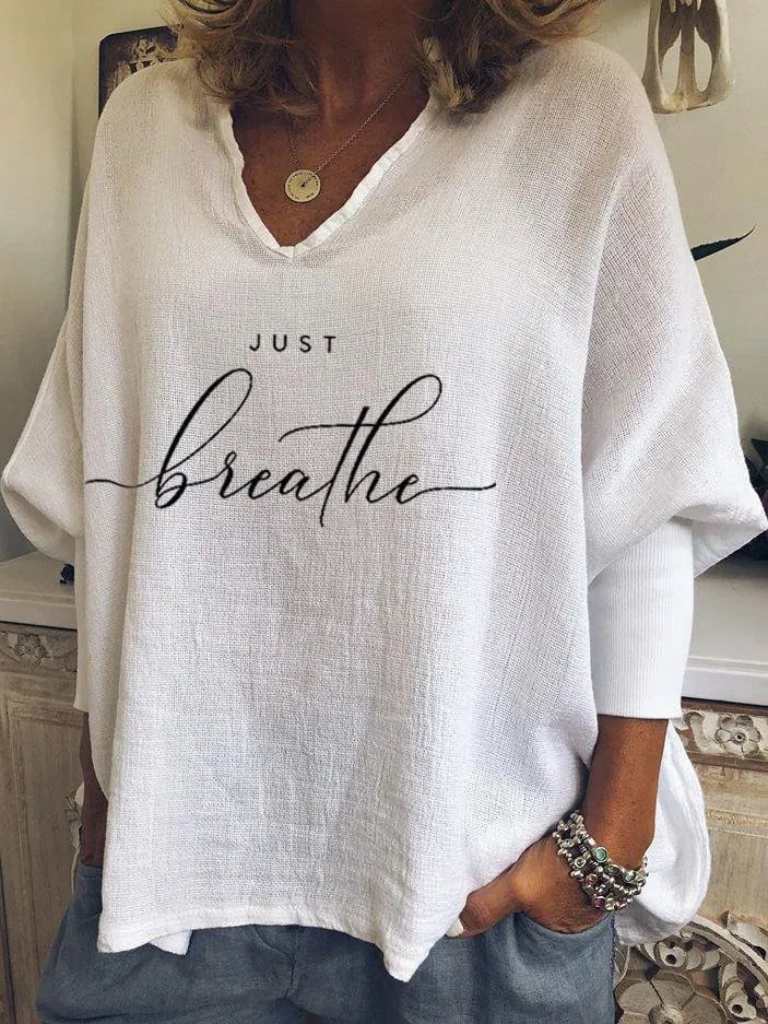 Women's loose-fit V-neck long sleeve top in brushed milk silk fabric for summer casual wear.