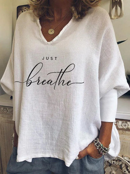 Women's loose-fit V-neck long sleeve top in brushed milk silk fabric for summer casual wear.