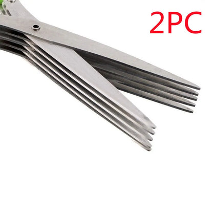 Green stainless steel multi-layer V-shaped kitchen scissors for cutting onions and herbs.