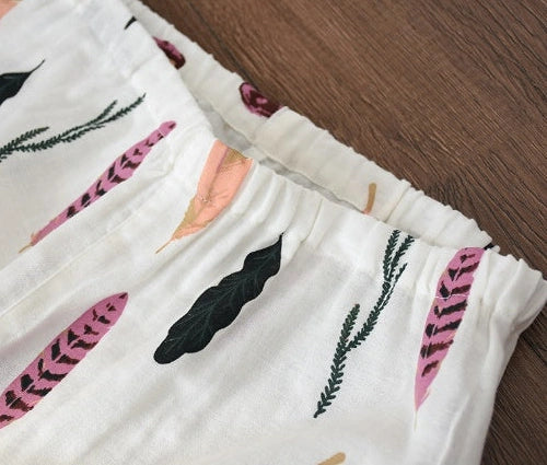 Traditional maternity pajama set with 100% cotton batik fabric, ankle-length trousers, and full-length bell sleeves