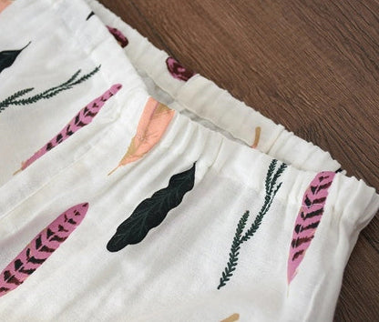 Traditional maternity pajama set with 100% cotton batik fabric, ankle-length trousers, and full-length bell sleeves
