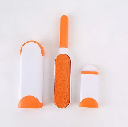 Blue reusable pet hair removal comb with sticky brush and self-cleaning base for sofas.