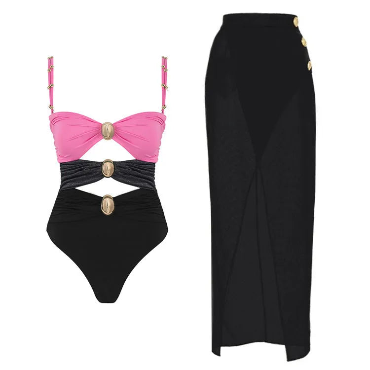 A woman's solid-colour one-piece swimsuit with a gold button detail and an attached matching skirt.