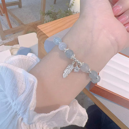 Small white girl crystal bracelet with feather XINGX blue moonlight colour and Korean style design