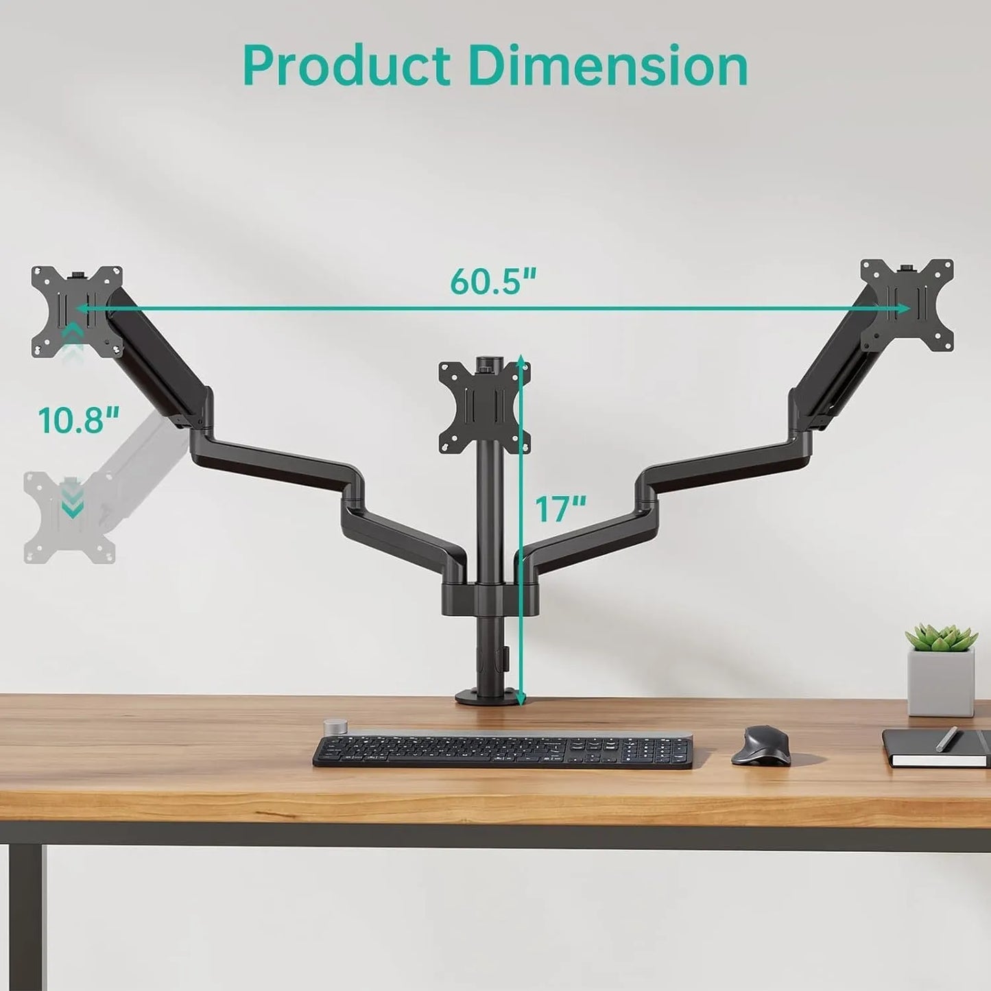 Black aluminium three-arm gas spring monitor holder mounted on a desk edge.