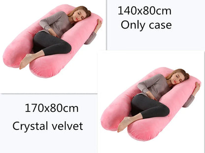 Large U-shaped pregnancy support pillow with removable cover and abdominal support belt.
