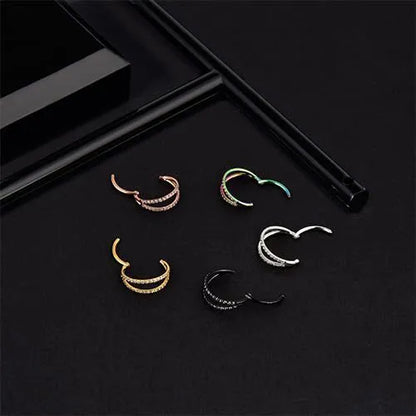 G23 titanium alloy nose ring with diamond-treated surface in gold or steel colour, showing precise gauge measurements