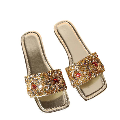 Gold women's flat slippers with rhinestone and sequin decoration on the PU upper.