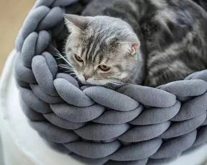 Soft, plush pet bed in various colors and sizes for cats and dogs to sleep comfortably