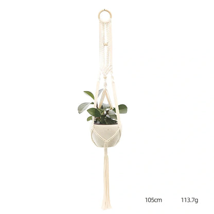 Hand-knitted cotton flowerpot net bag showing mesh pattern and hanging installation