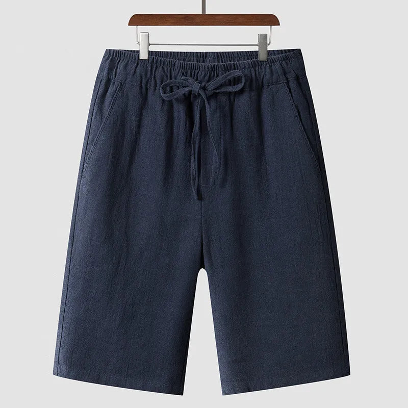 Men's linen casual shorts with elastic waistband in loose cropped design showing beige colour option