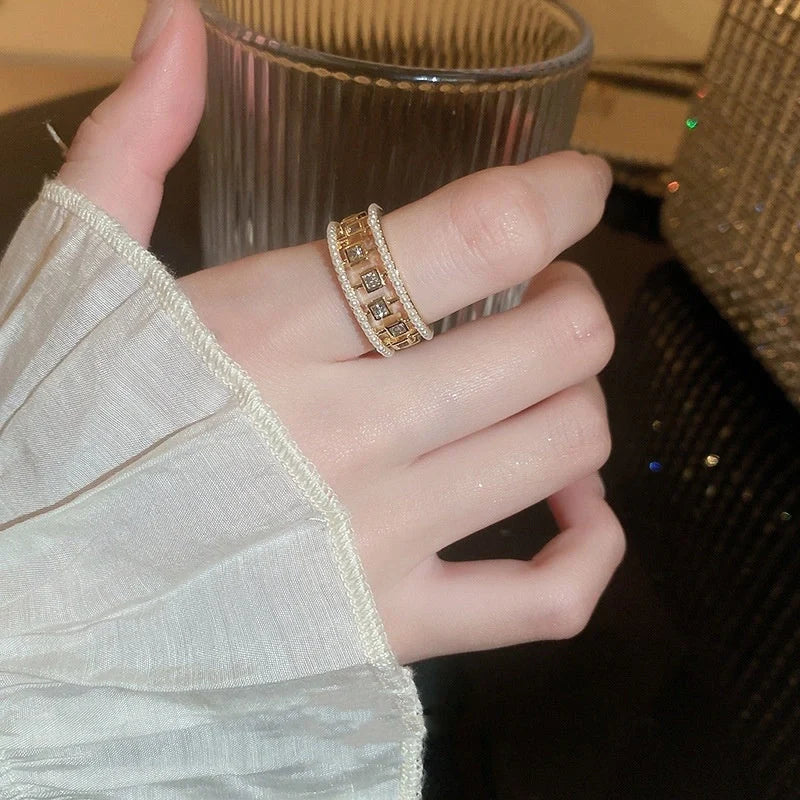 Elegant pearl hollowed-out square open-end zircon ring for women, fashion jewelry with geometric design.