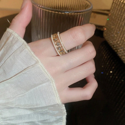 Elegant pearl hollowed-out square open-end zircon ring for women, fashion jewelry with geometric design.