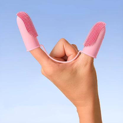 Pet tooth cleaning finger set showing double finger toothbrush covers in pink, blue green, and grass yellow colours.