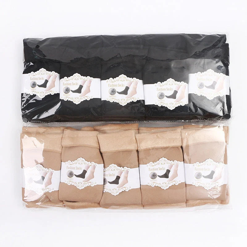 Cozy winter tube socks for men and women in black and skin color options
