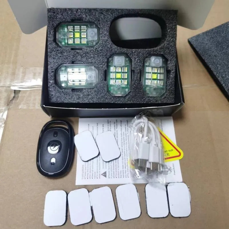 5W remote control strobe light set with four flashing lamps, ABS housing, and charging cable for vehicle modification.