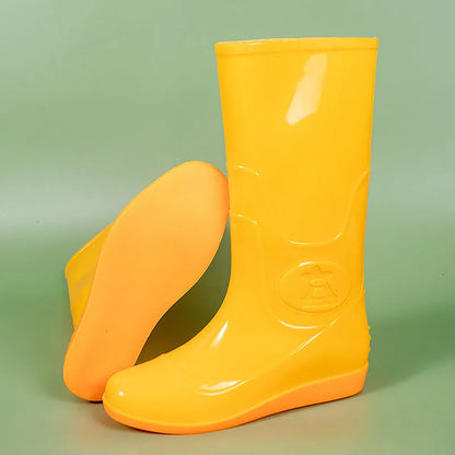 Men's white and yellow flat plastic rain boots with high tube design on a neutral background.