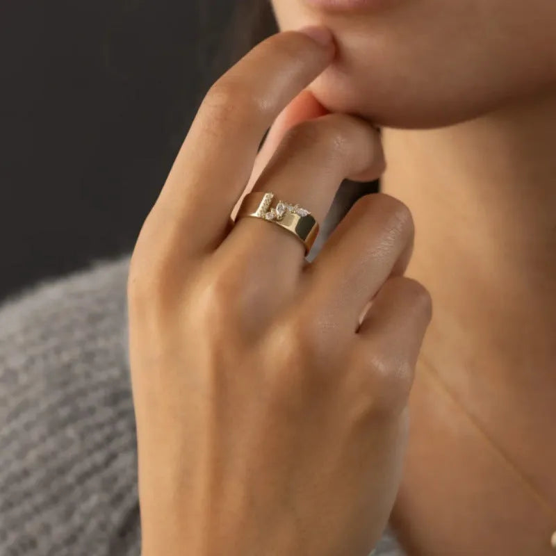 Women's copper ring with electroplated gold finish and shining zircon accents on finger