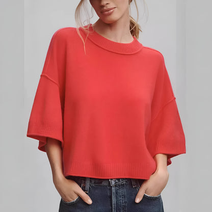 Red short viscose T-shirt with an exposed navel design on a mannequin.