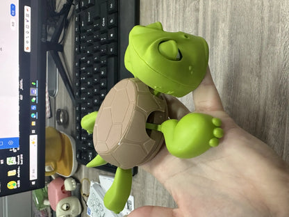 Turtle-shaped coaster in light green colour with heat insulation function, made from ABS plastic.