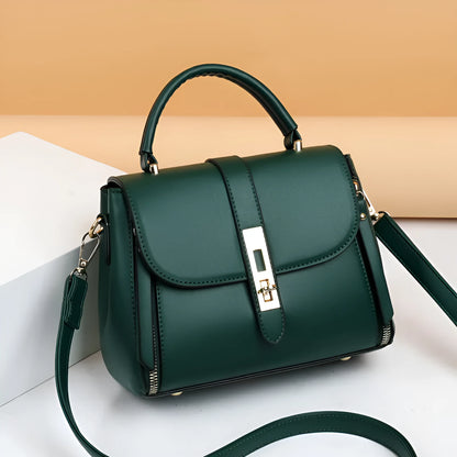 Women's soft black PU leather vertical messenger bag with adjustable strap, showing interior polyester lining.