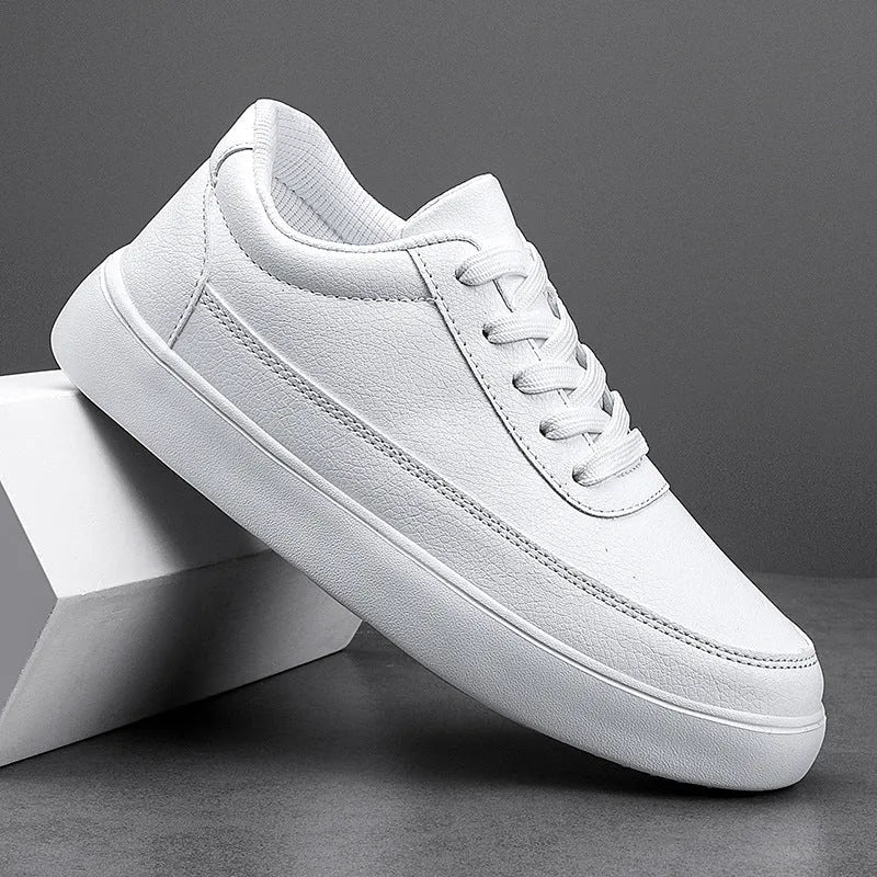 Women's lightweight leather flat casual shoes in gold colour with front lace-up design on a white background