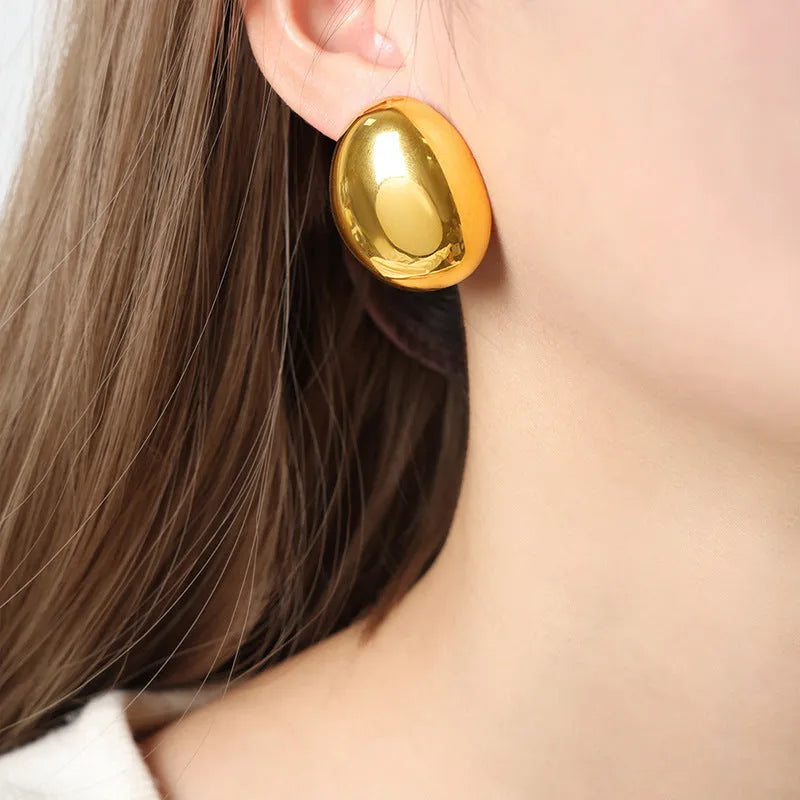 Geometric stainless steel ear studs with glazed surface in 18K gold colour finish