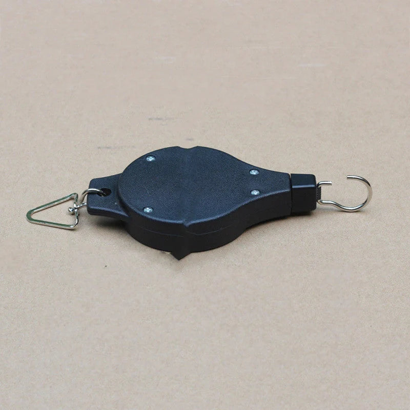 Adjustable hanging hook with pulley system for bird cages and baskets