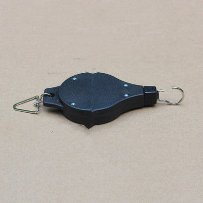 Adjustable hanging hook with pulley system for bird cages and baskets