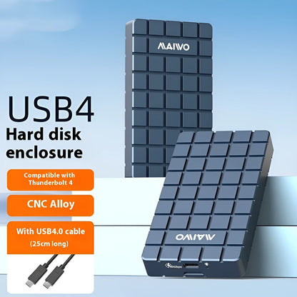 Silver aluminium alloy USB4 hard disk enclosure for M.2 SSDs, shown next to a laptop.