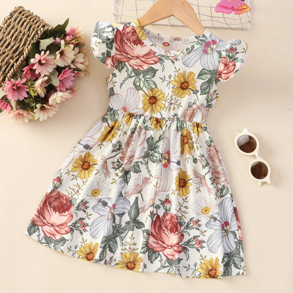 Girl's flounced sleeve dress with A-line skirt in polyester, available in multiple colours for ages 1-6 years