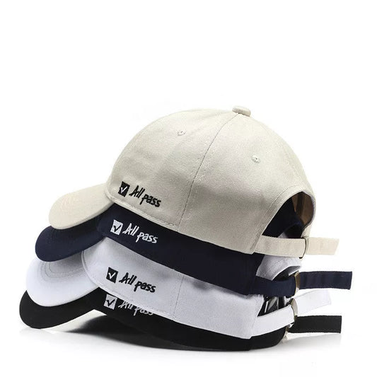 Adjustable cotton baseball cap with side letter embroidery in multiple colors