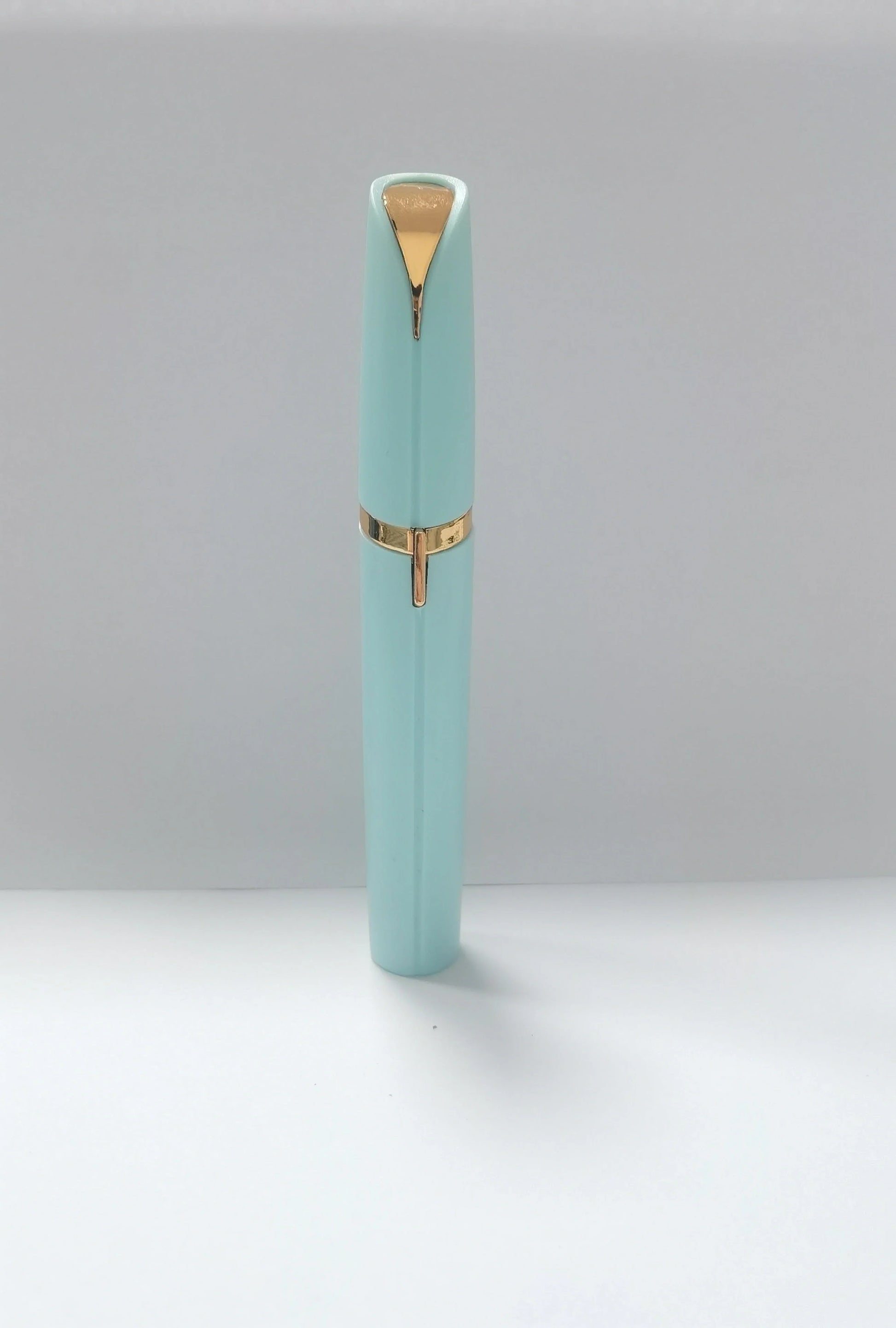 Mini electric eyebrow trimmer with LED light and gold plated head