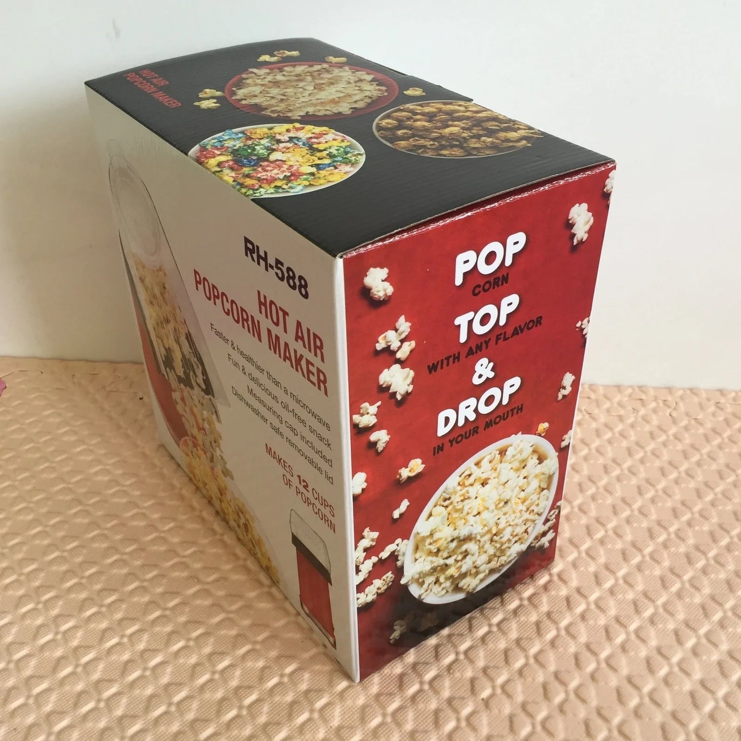 Red home popcorn machine with 1200W hot air popping system and 30cm dimensions