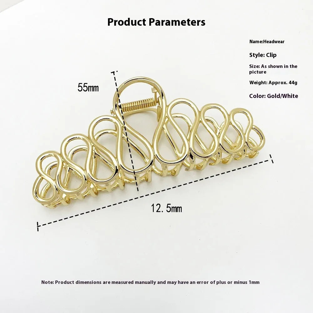 Large gold and silver minimalist hair clip with tassel detail for women's thick hair and updos.