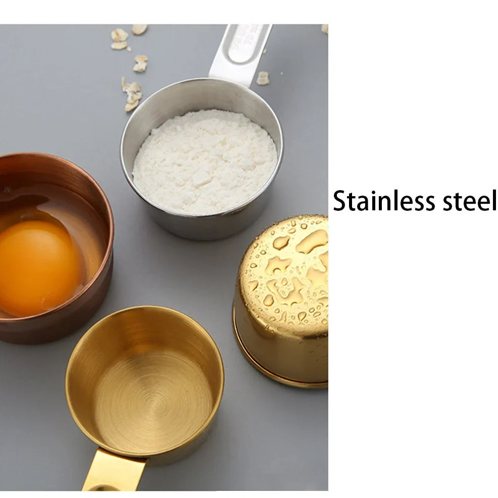 Stainless steel measuring spoons and cups set with engraved markings and removable storage rings