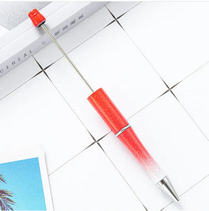 Rotating bead ballpoint pen in gradient colour with ABS plastic and steel wire construction