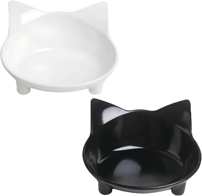 Black shallow melamine pet bowl with non-slip rubber base on a kitchen floor