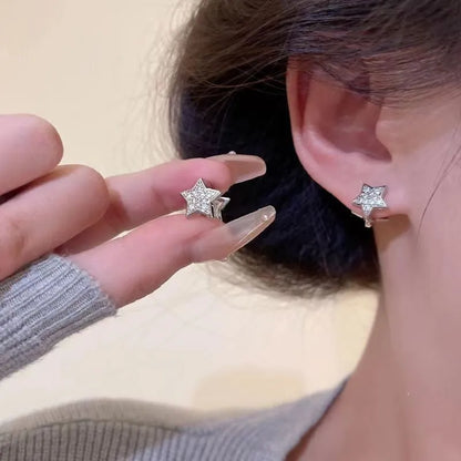 White star zircon earrings for women with copper base and electroplated finish, geometric shape, one pair