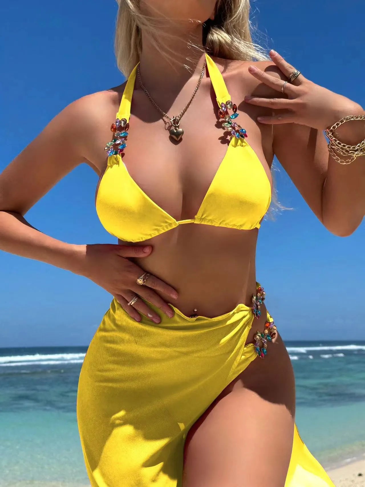 Three-piece polyester bikini set with mesh long skirt in rose red or yellow colour, sizes S M L