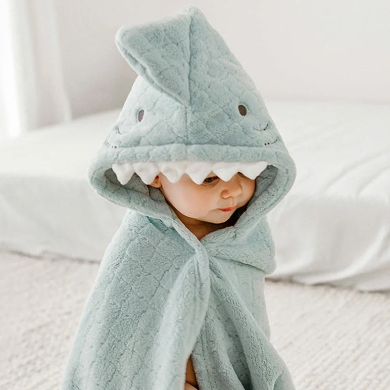 Coral fleece bath towel with animal design measuring 125cm by 80cm showing plush texture