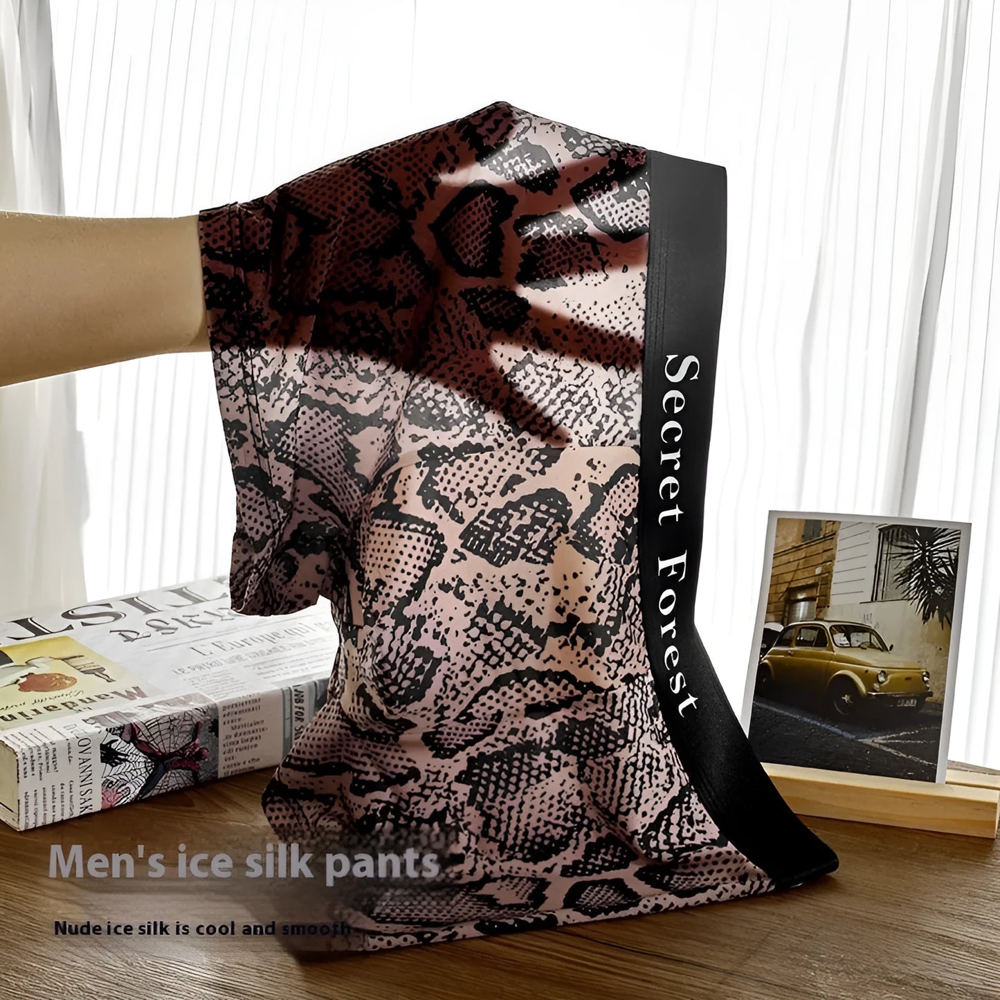 Men's loose fit thin boxer shorts in black, grey, and brown colour options.