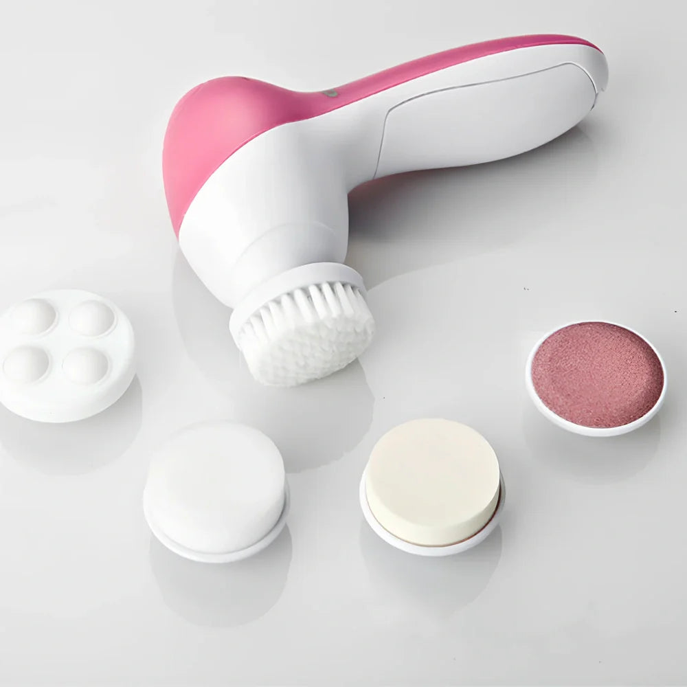 Pink electric facial cleanser with 5 attachments including soft brush, rolling massager, and sandstone head for skincare