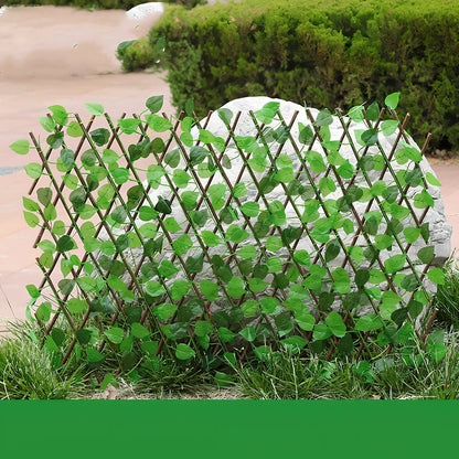 Plastic simulation wooden fence panel showing realistic wood grain texture in outdoor setting